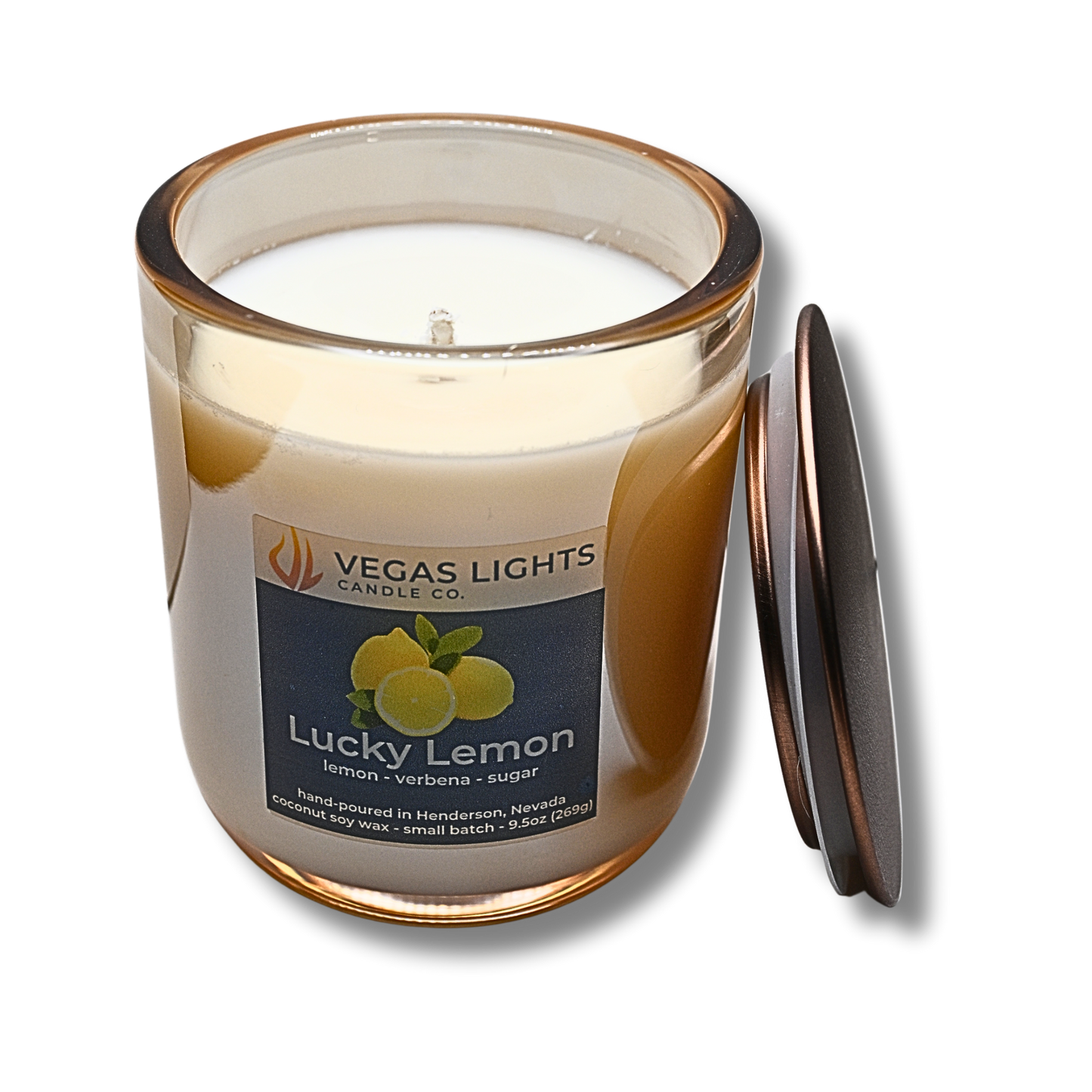 Vegas Lights Candle Co. Lucky Lemon candle with a champagne luster glass jar and bronze lid on a white background