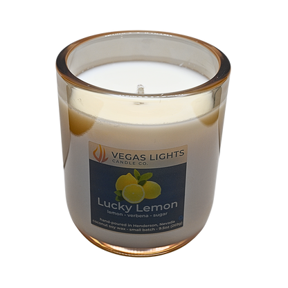 Vegas Lights Candle Co. Lucky Lemon candle in a glass jar on a white background