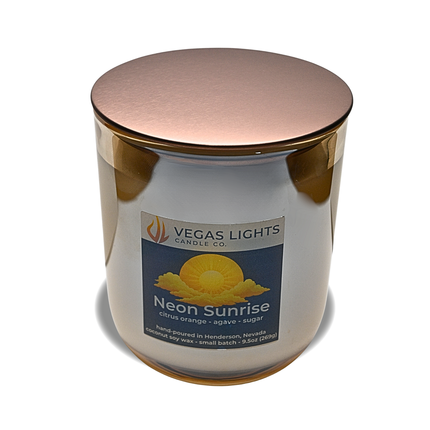 Vegas Lights Candle Co. candle with a bronze lid on a white background