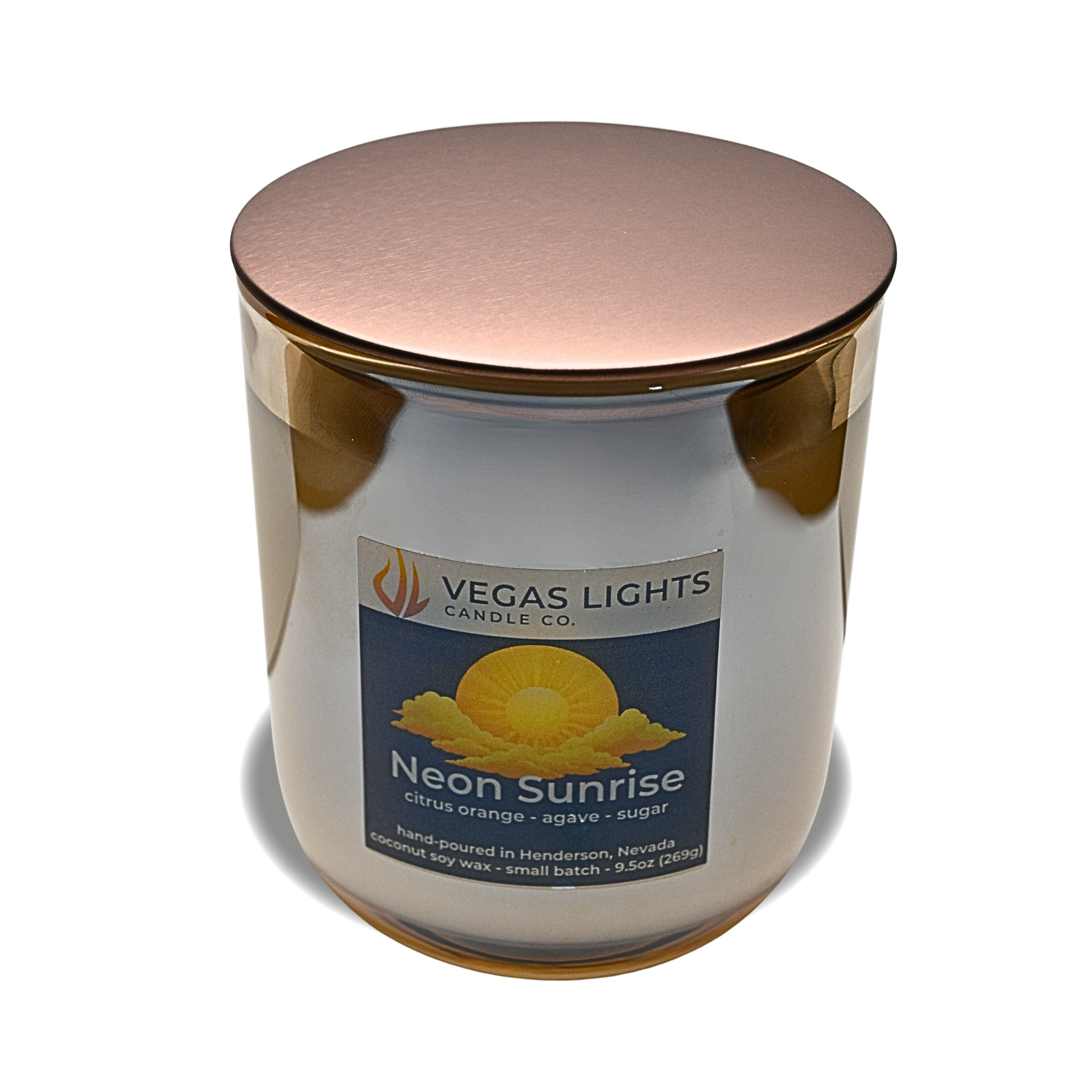 Vegas Lights Candle Co. candle with a bronze lid on a white background