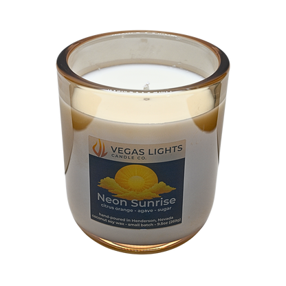 Vegas Lights Candle Co. 'Neon Sunrise' candle with a label on a white background