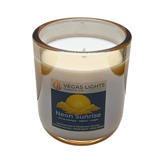 Vegas Lights Candle Co. 'Neon Sunrise' candle with a label on a white background