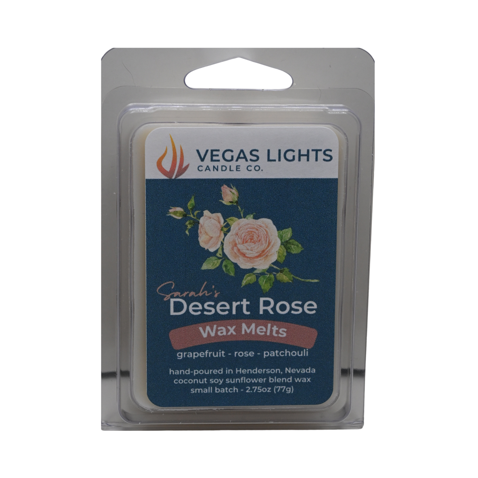 Vegass Lights Candle Co. Desert Rose wax melts packaging with floral decorations on a blue background