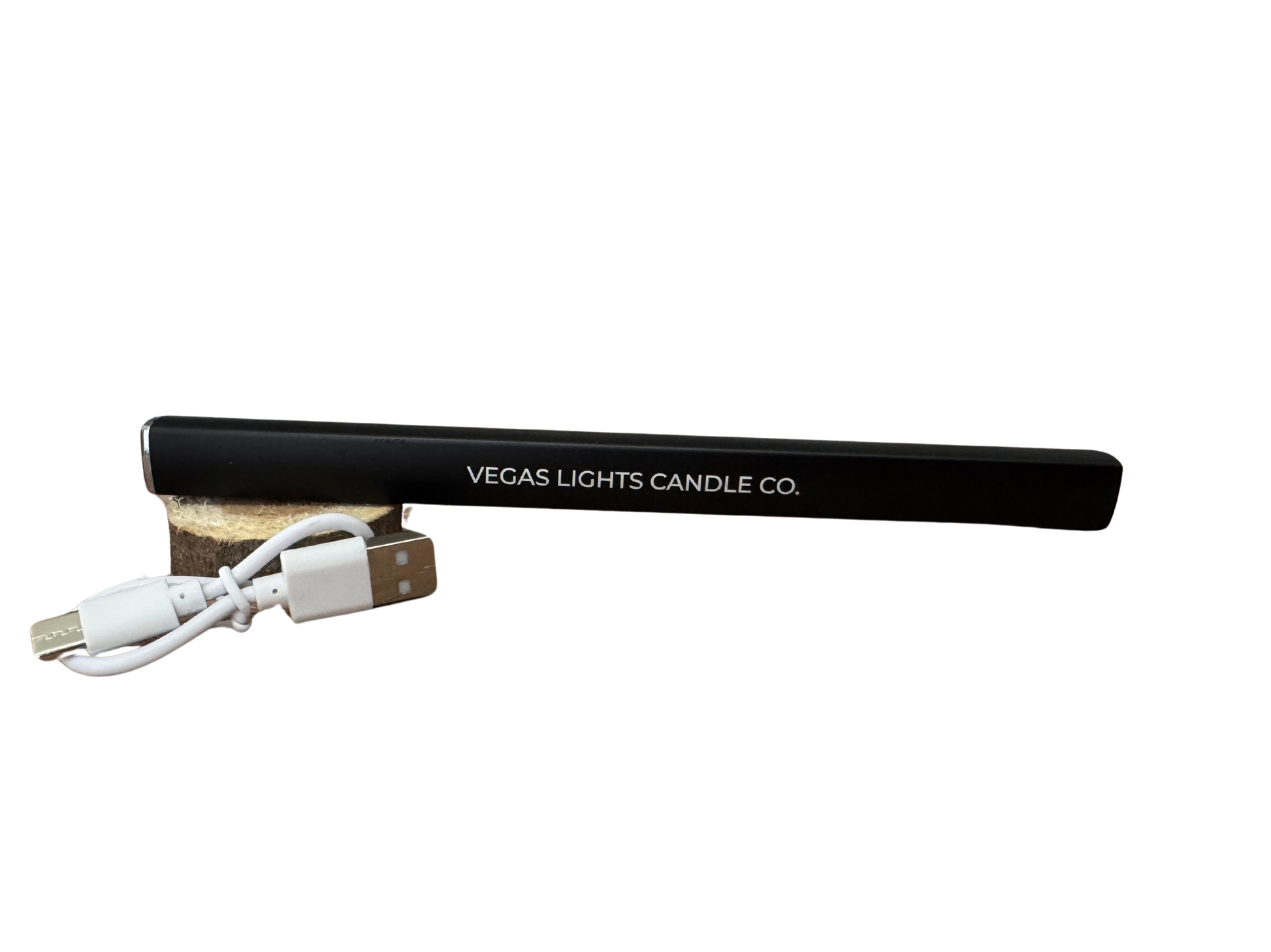 Black lighter with USB cable and wooden base on a white background, branded 'Vegas Lights Candle Co'.